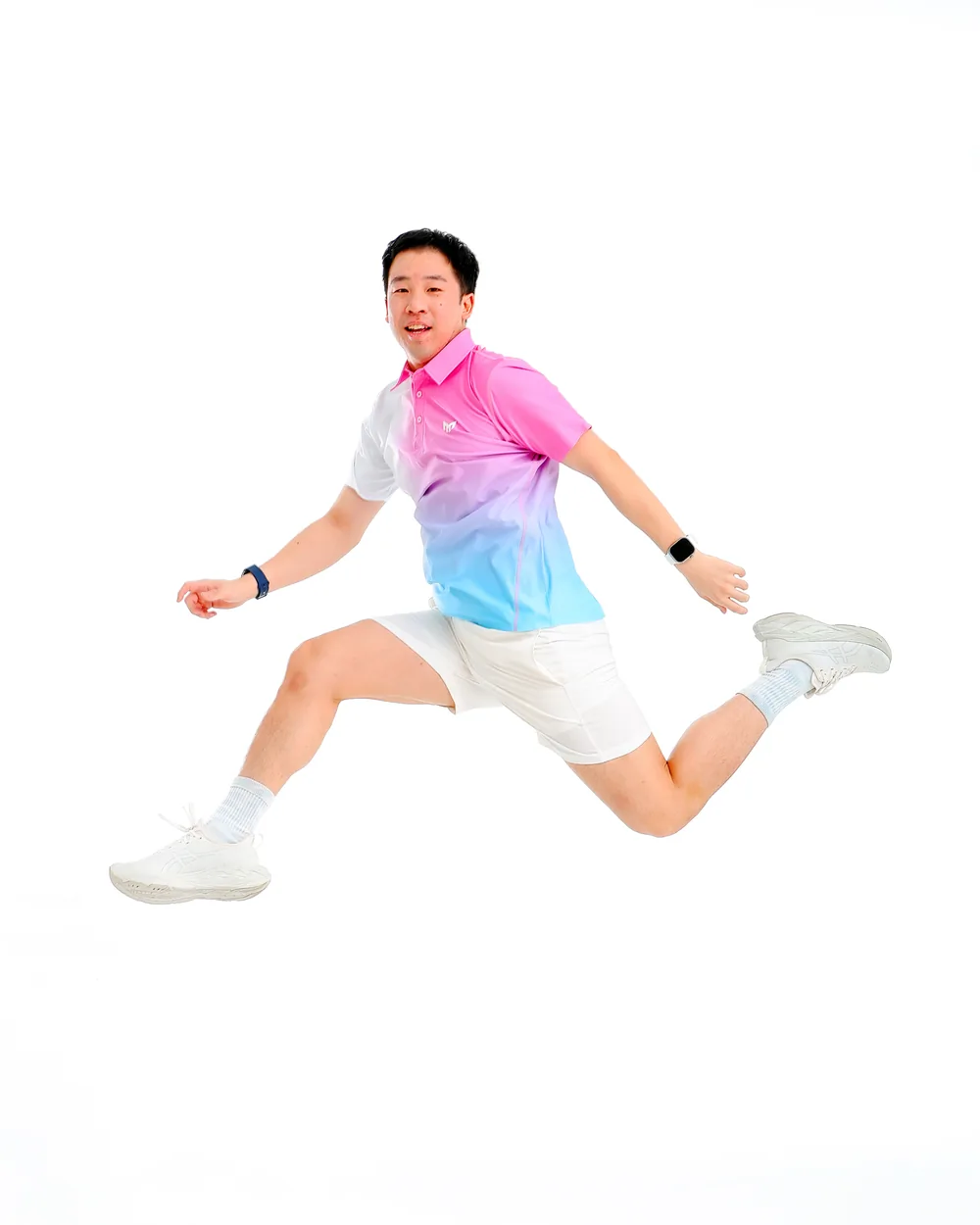 A man in a Cotton Candy polo leaps mid-air